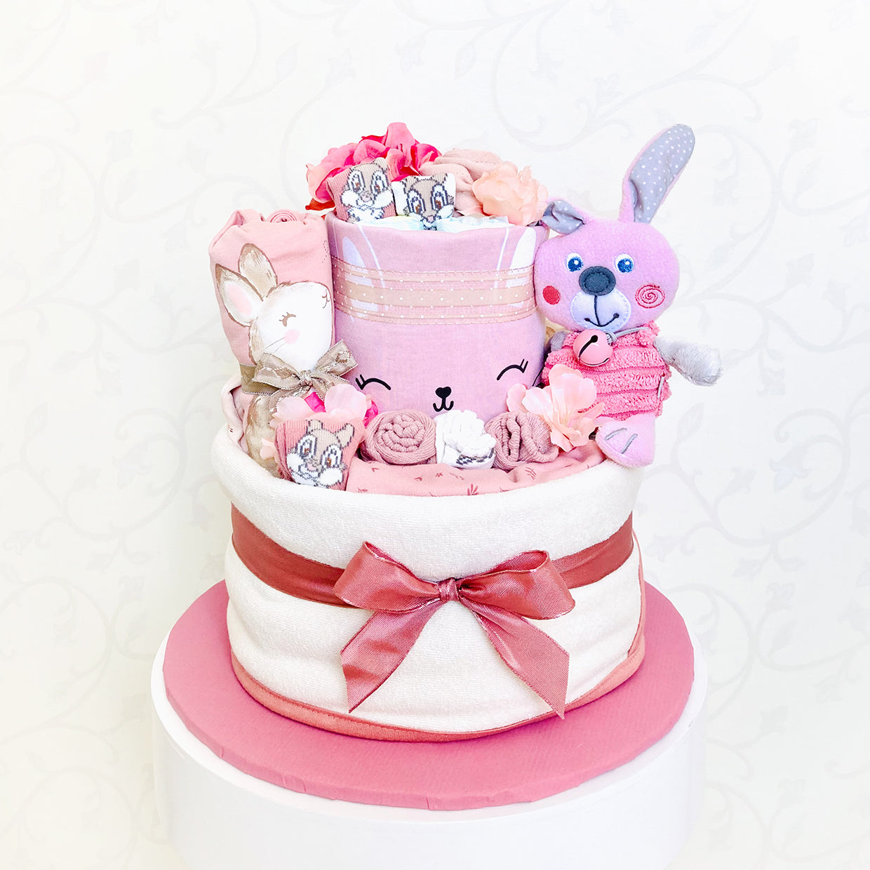 moments Windeltorte Hasenbande, rosa, beige zur Geburt