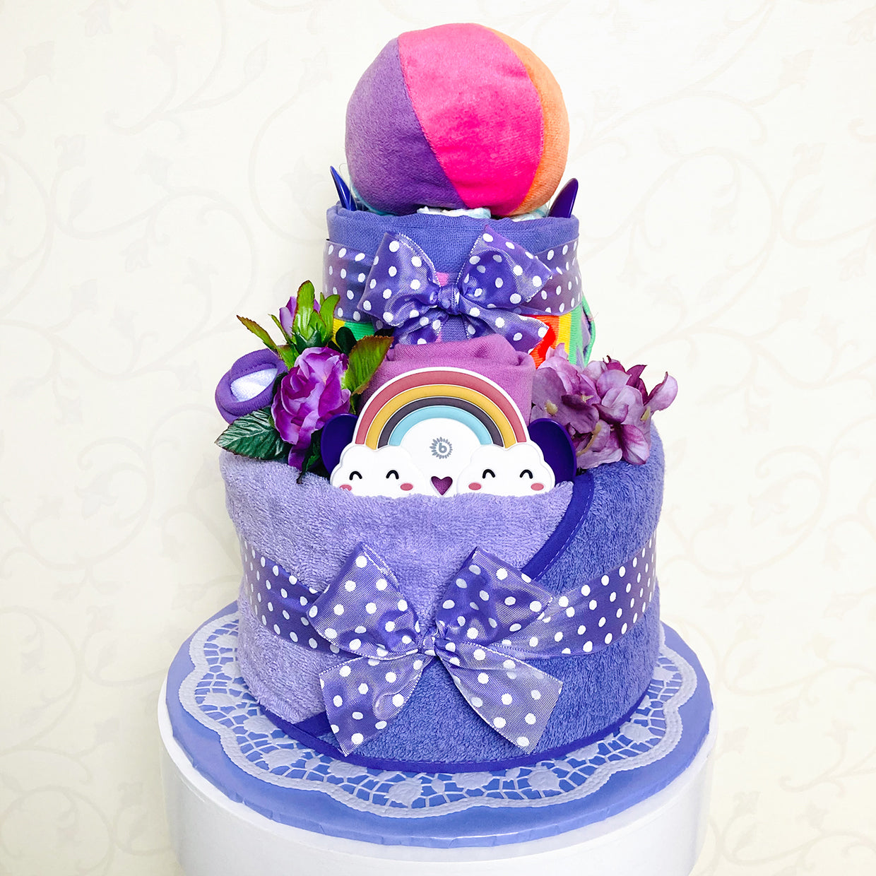 moments Windeltorte Regenbogendiva lila zur Geburt