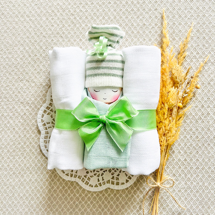 moments Windelbaby hellgrün zur Geburt